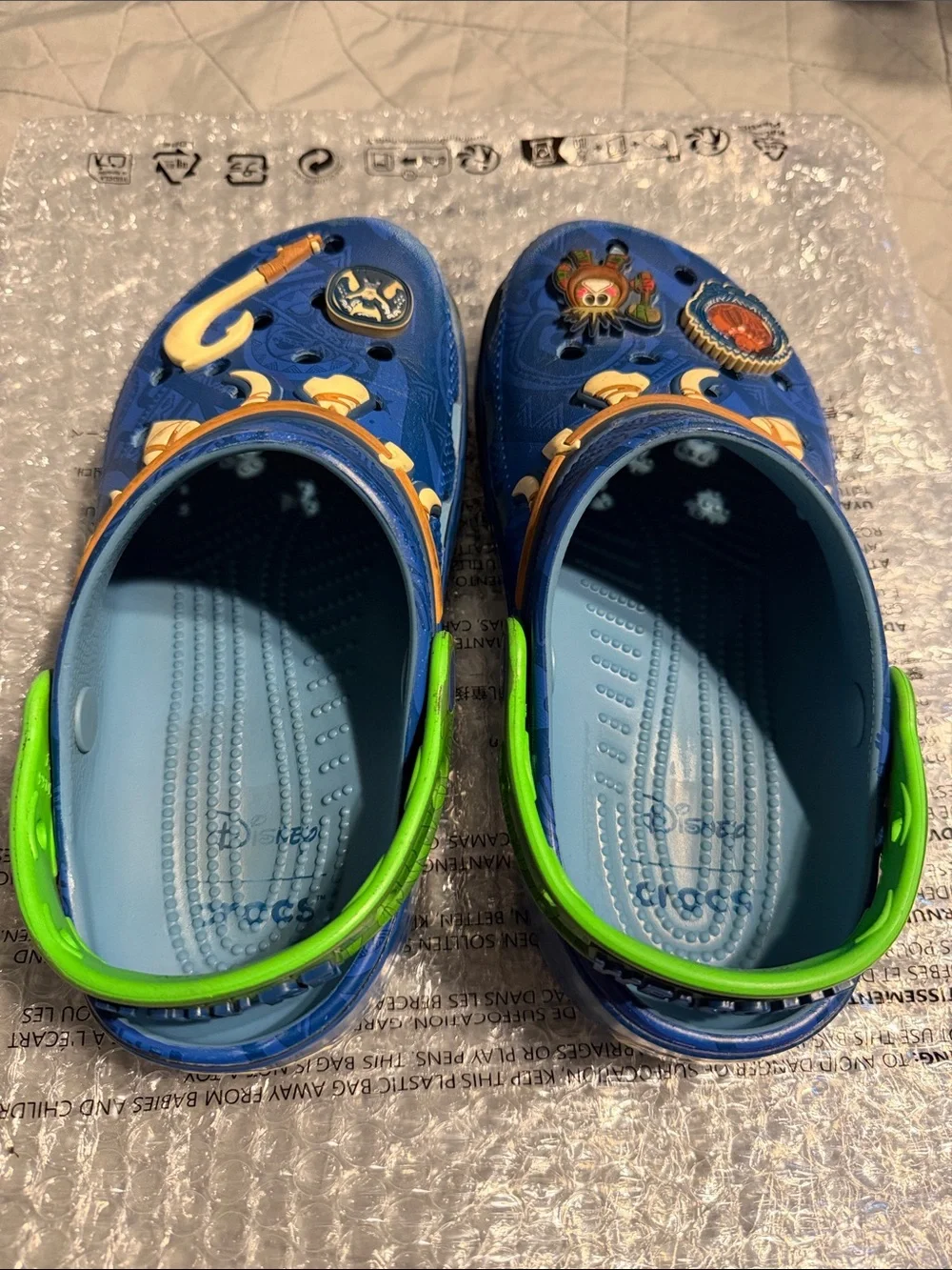 USED!!! CROCS x Disney Moana Maui - You’re Welcome- Kids Classic Clogs